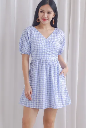 Evvie Gingham Embro Faux Wrap Romper In Blue