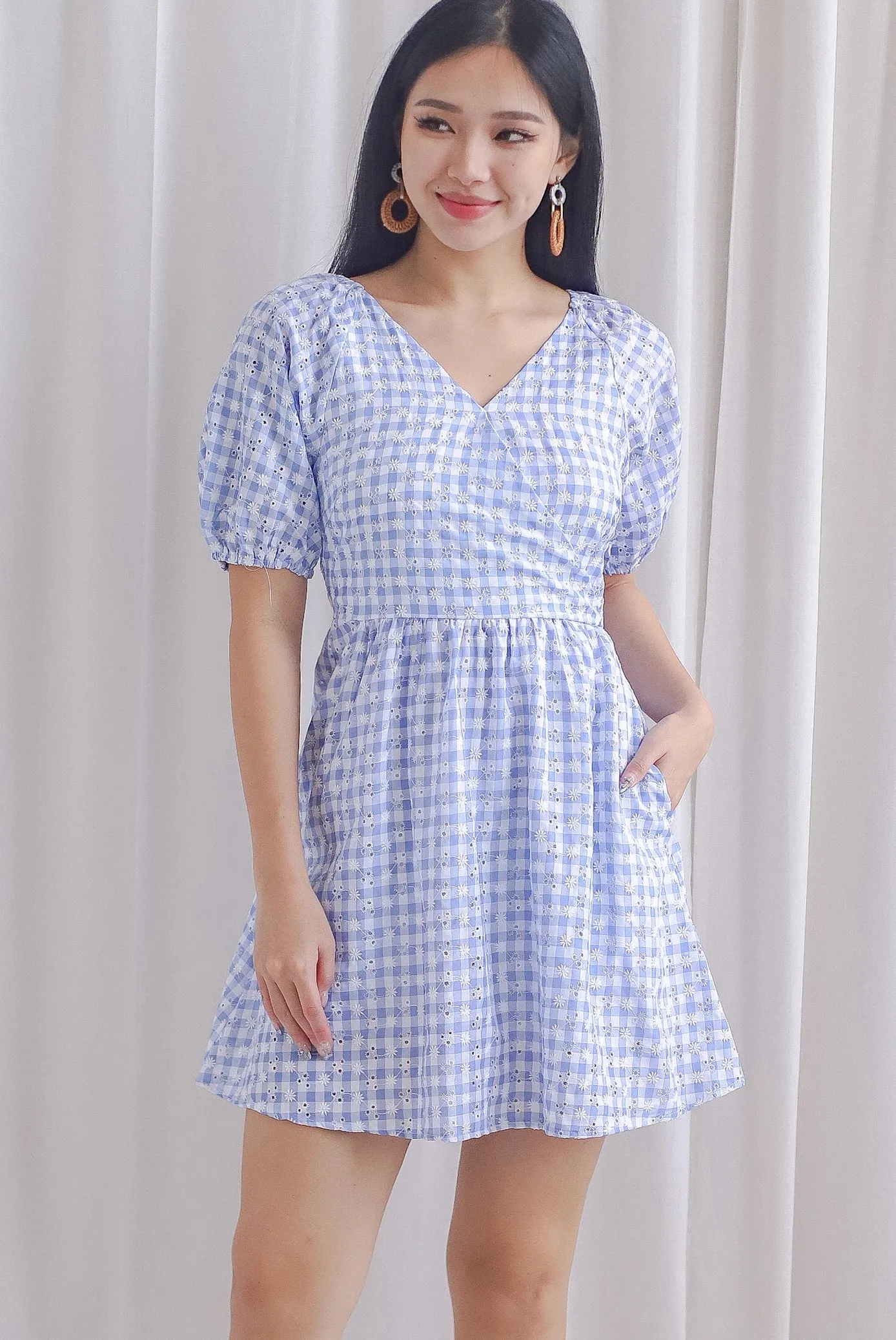 Evvie Gingham Embro Faux Wrap Romper In Blue