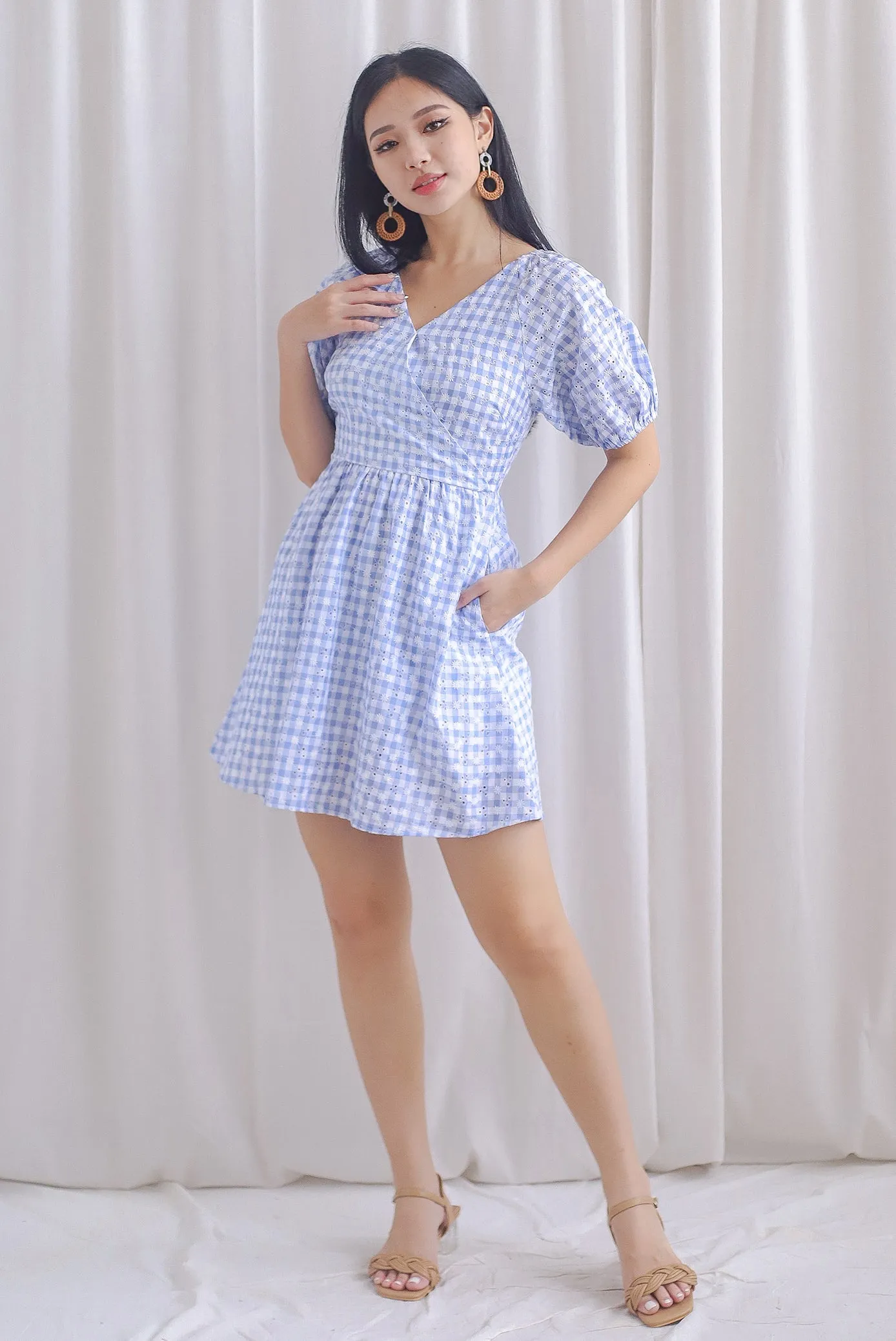 Evvie Gingham Embro Faux Wrap Romper In Blue