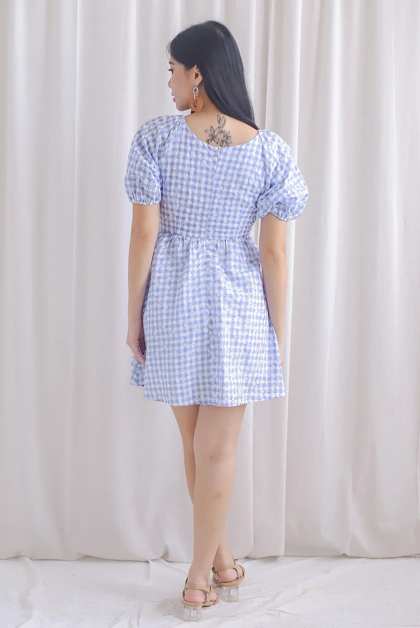 Evvie Gingham Embro Faux Wrap Romper In Blue