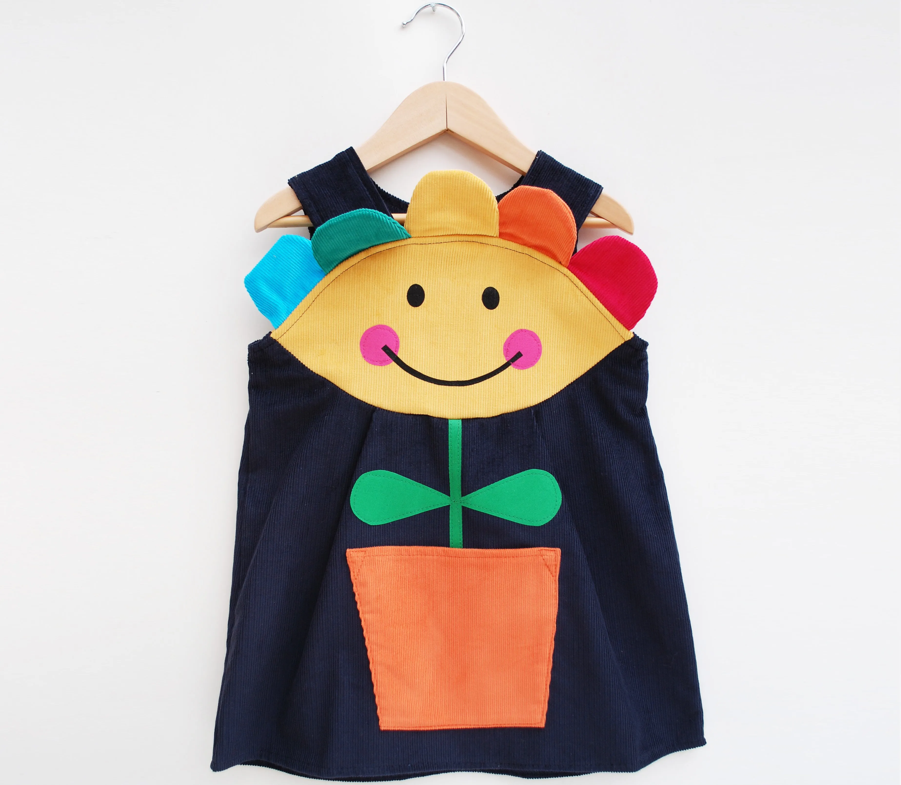 Happy Flower Face Girls Rainbow Pinnie Dress in Corduroy