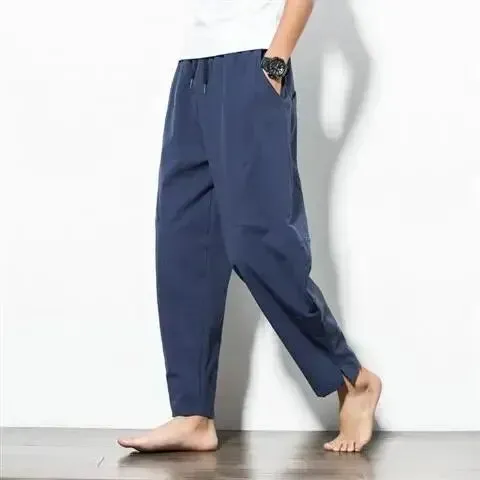 Locker sitzende Leinenhose für Herren mit trendigen Haremshosen und niedrigem Schritt