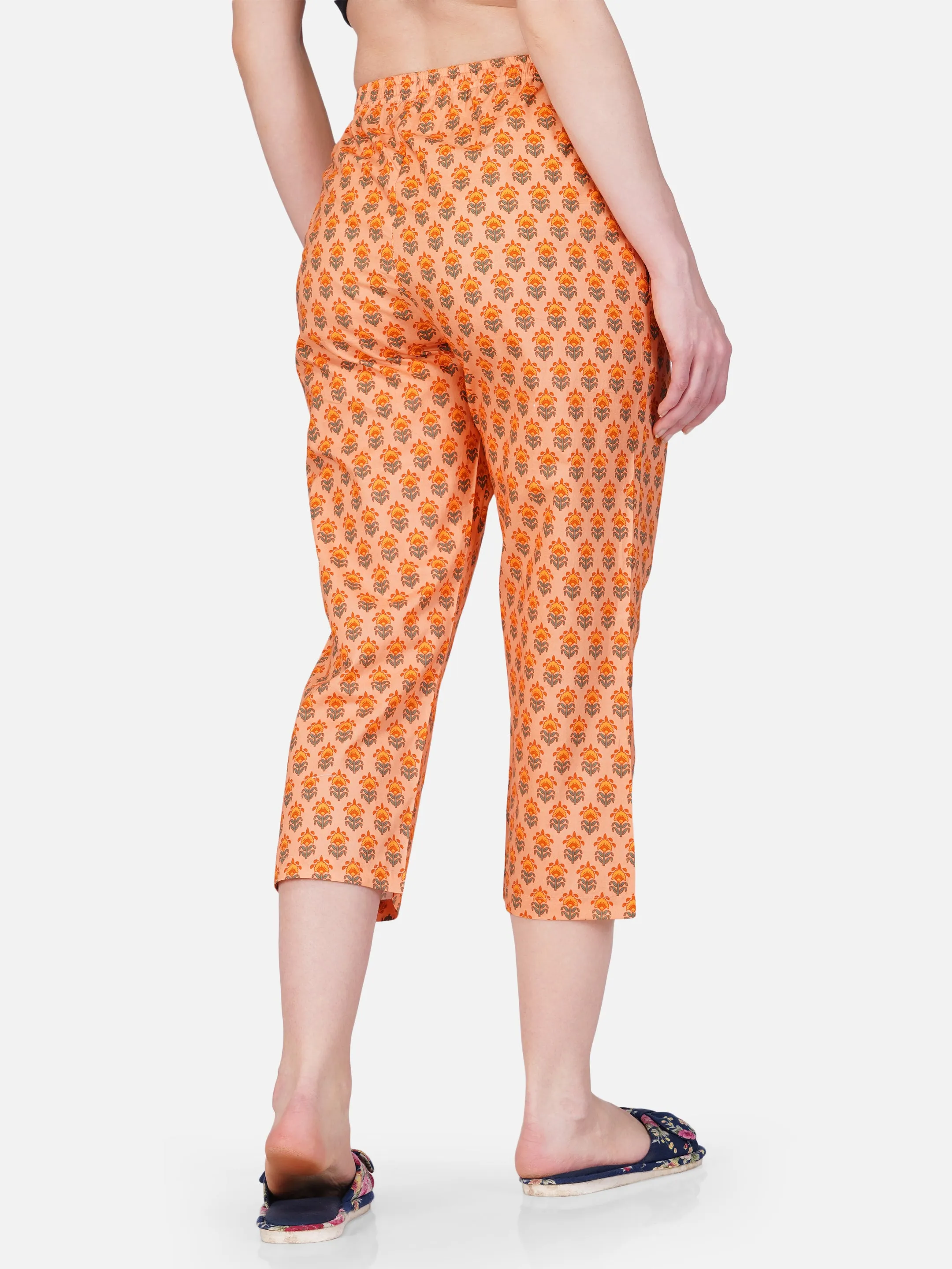 Orange floral motif printed capris