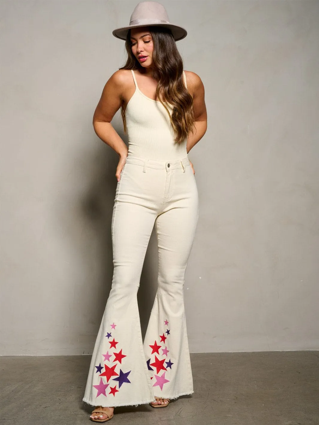 WOMEN'S BUTTON CLOSURE BELL LEGS STARS PRINT DENIM PANTS